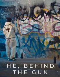 He, Behind The Gun